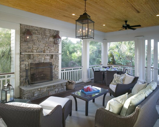 Screened Porch Features Outdoor Fireplace